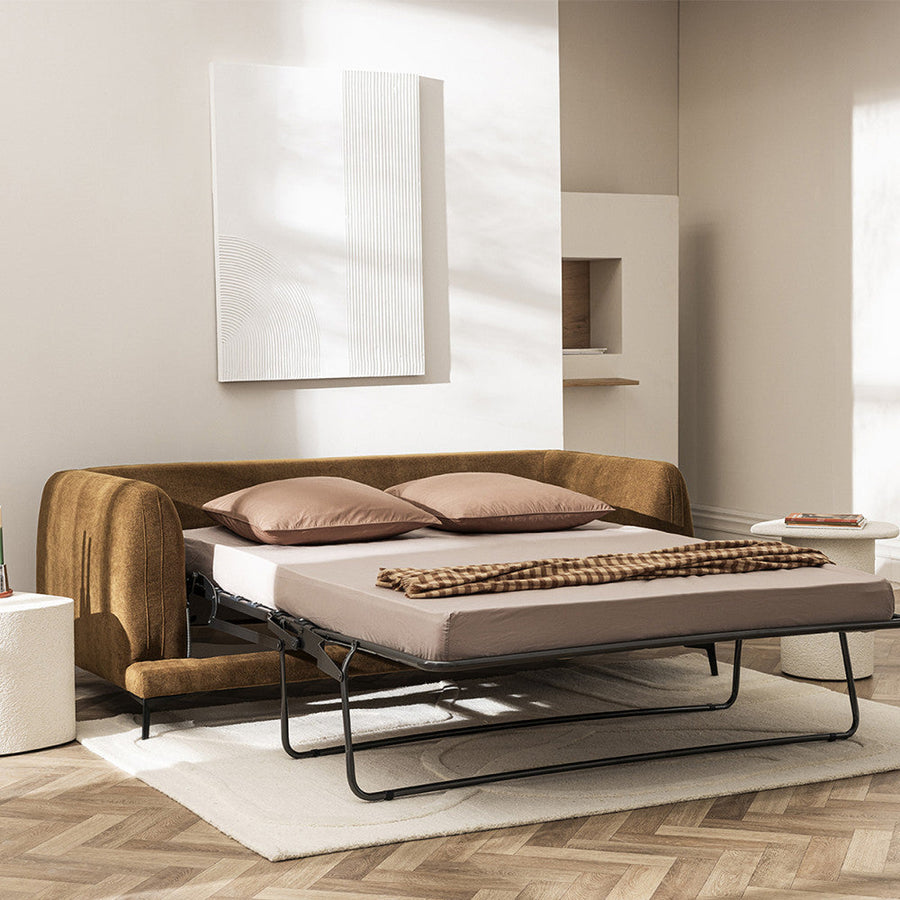 Canapé convertible aux lignes arrondies sur quatre pieds en métal noir, couleur bronze, vue 6