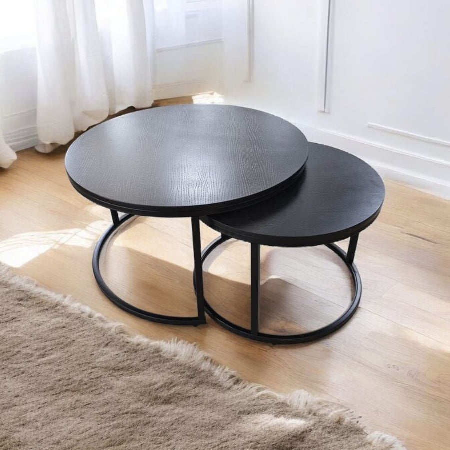 Deux tables basses rondes gigognes en bois noir sur pieds métal noir, vue 2
